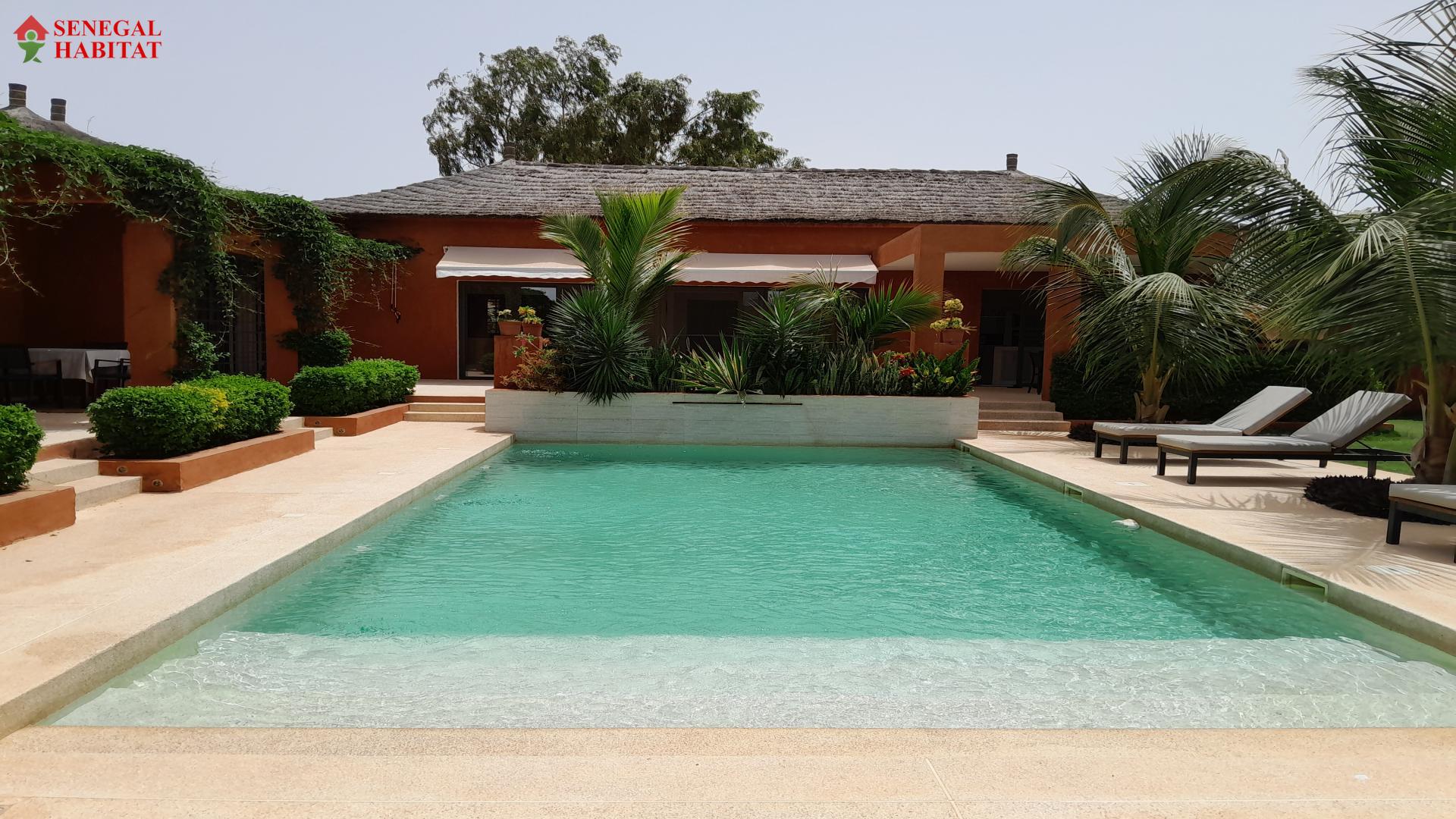 villa de qualit  type riad sur 1000 m2  de terrain  4 chambres 4 salles d'eau belles prestations piscine  ngaparou proche route